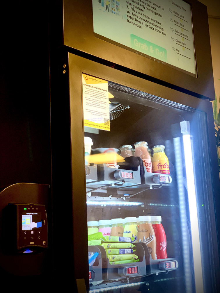 "AI Vending Machines Just Normal Fridges?" Where Exactly is the AI