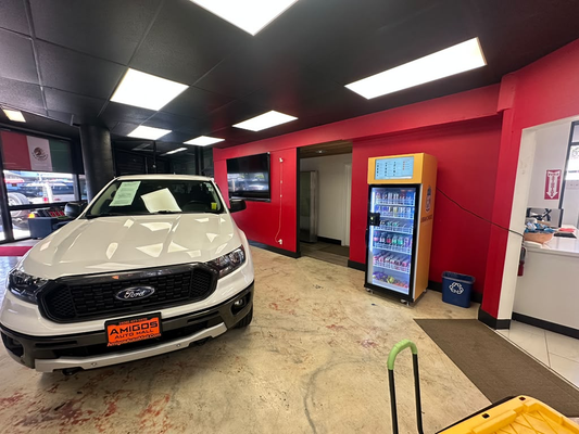 WEIMI AI vending machine installed inside an automotive dealership in Italy